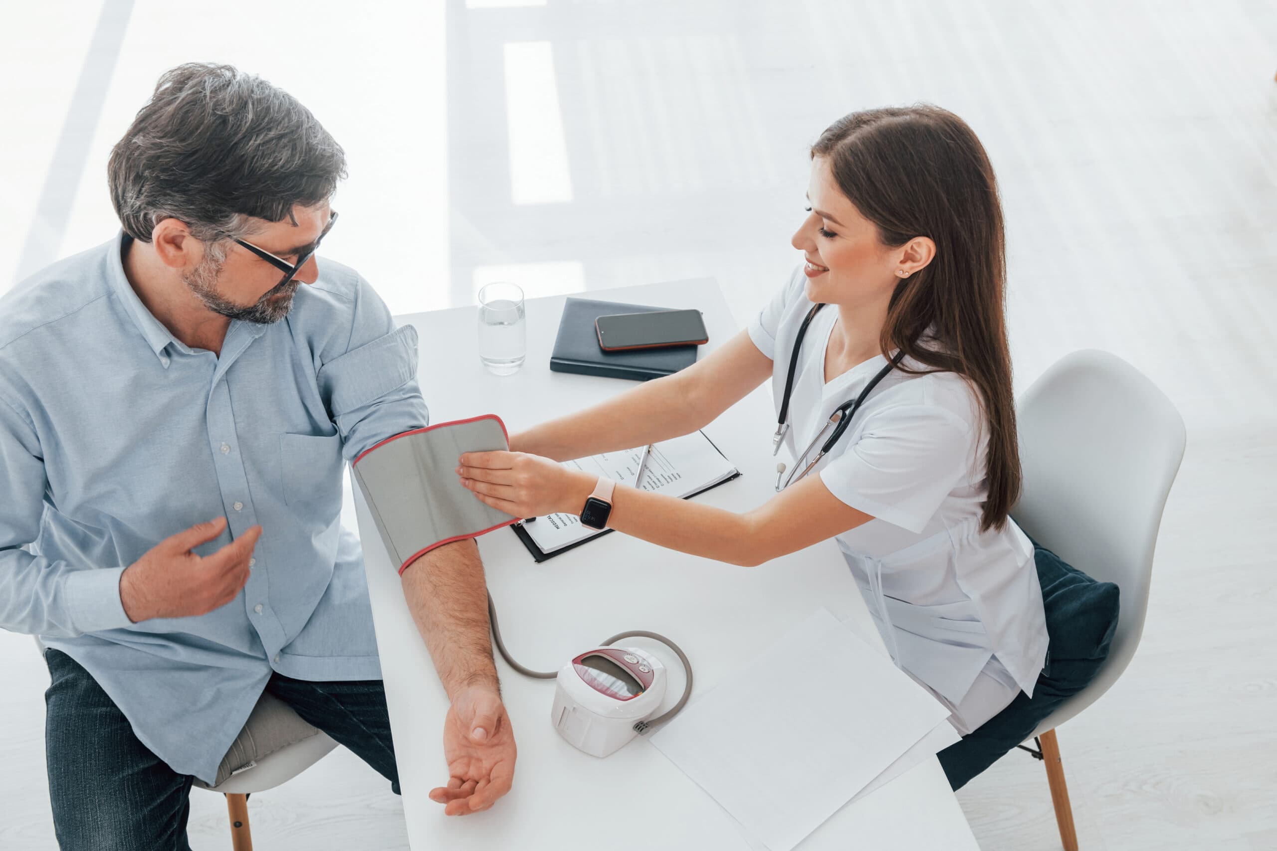 Patient having routine physical exam for chronic condition management