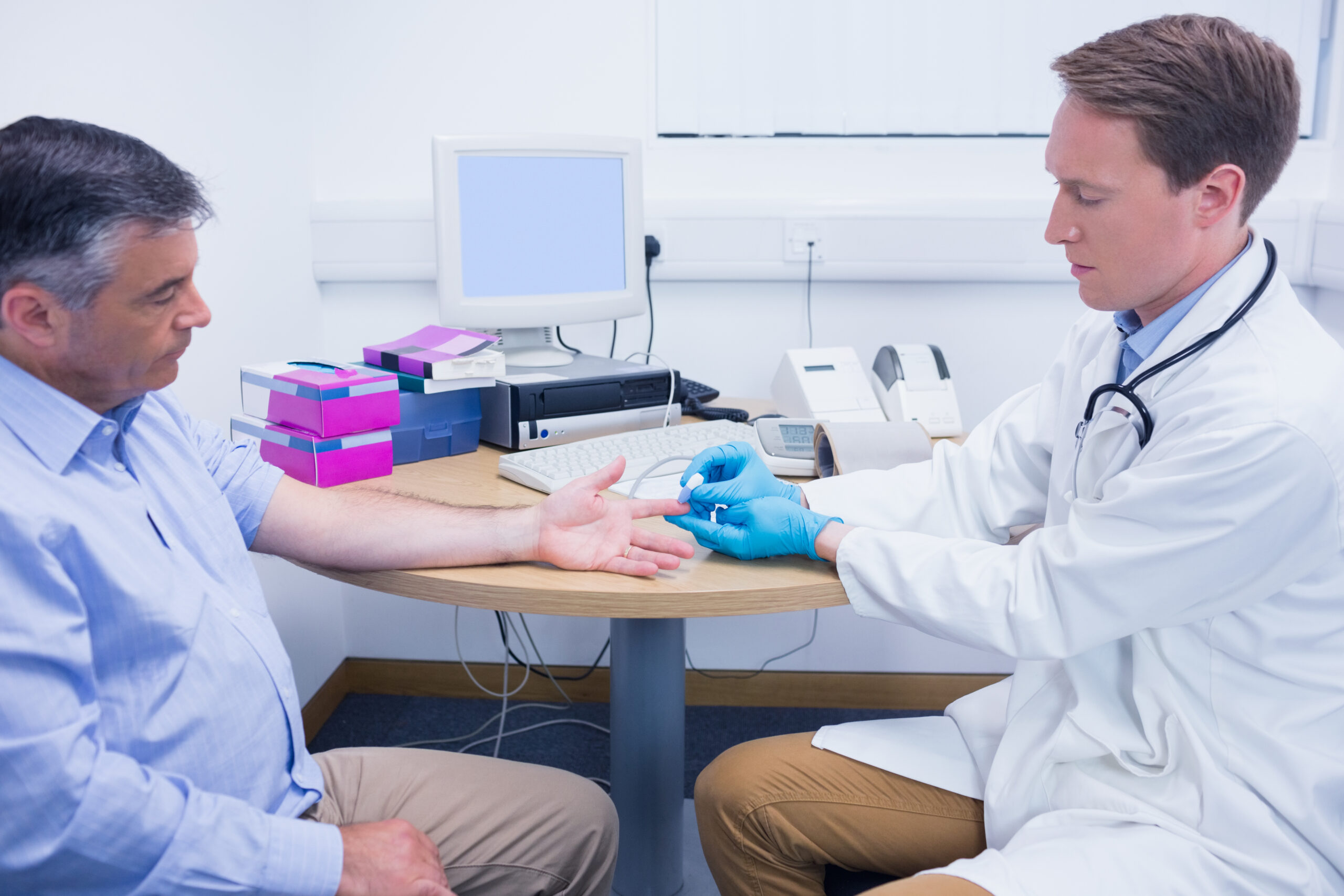 Doctor reviewing MPV blood test results at Avant Medical Group